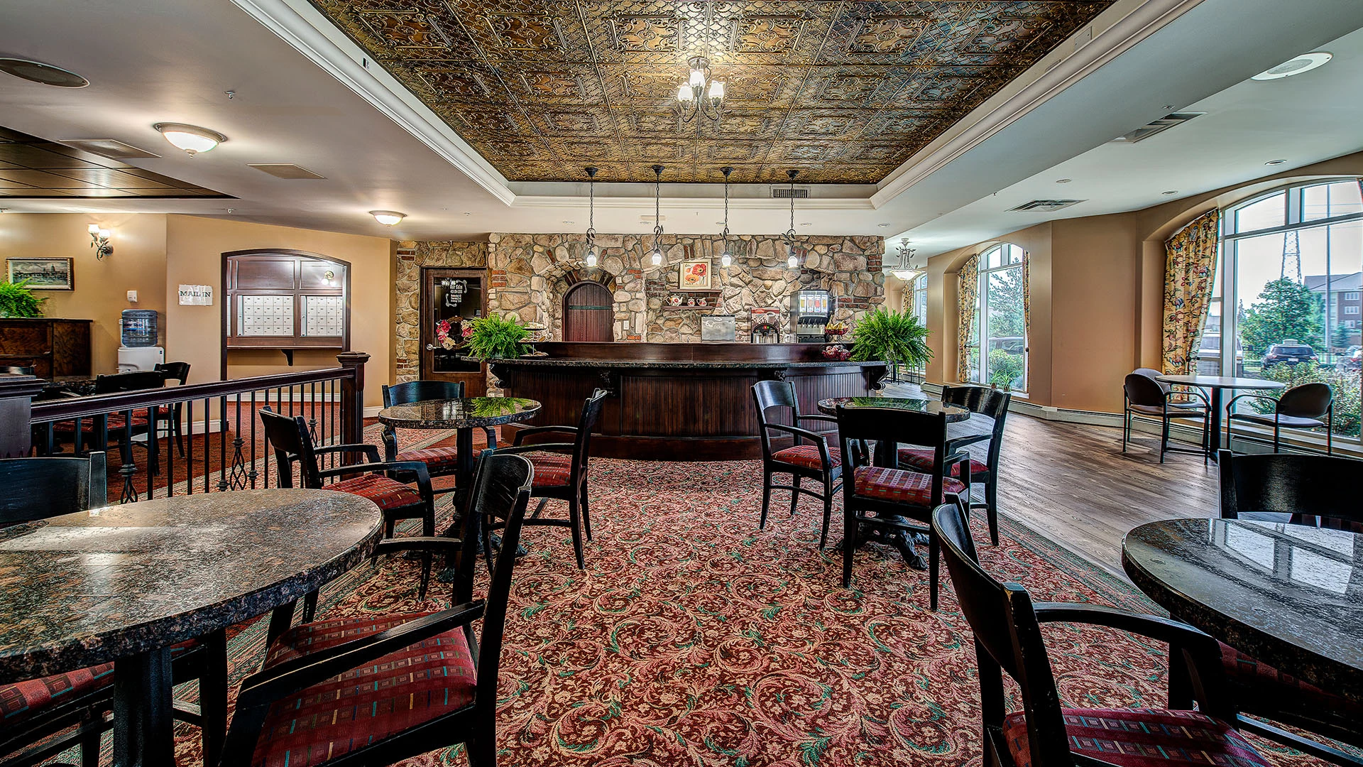 dining room with bar in the back