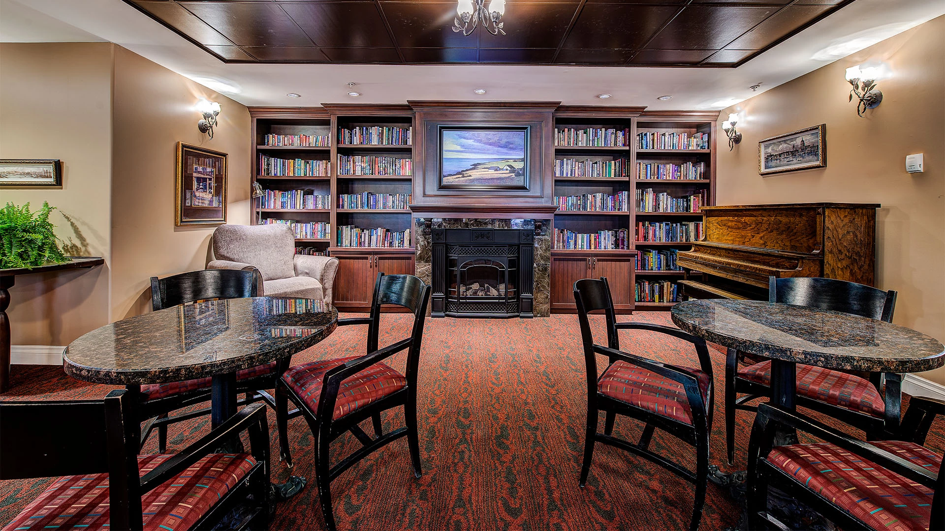 room with a bookshelf and piano