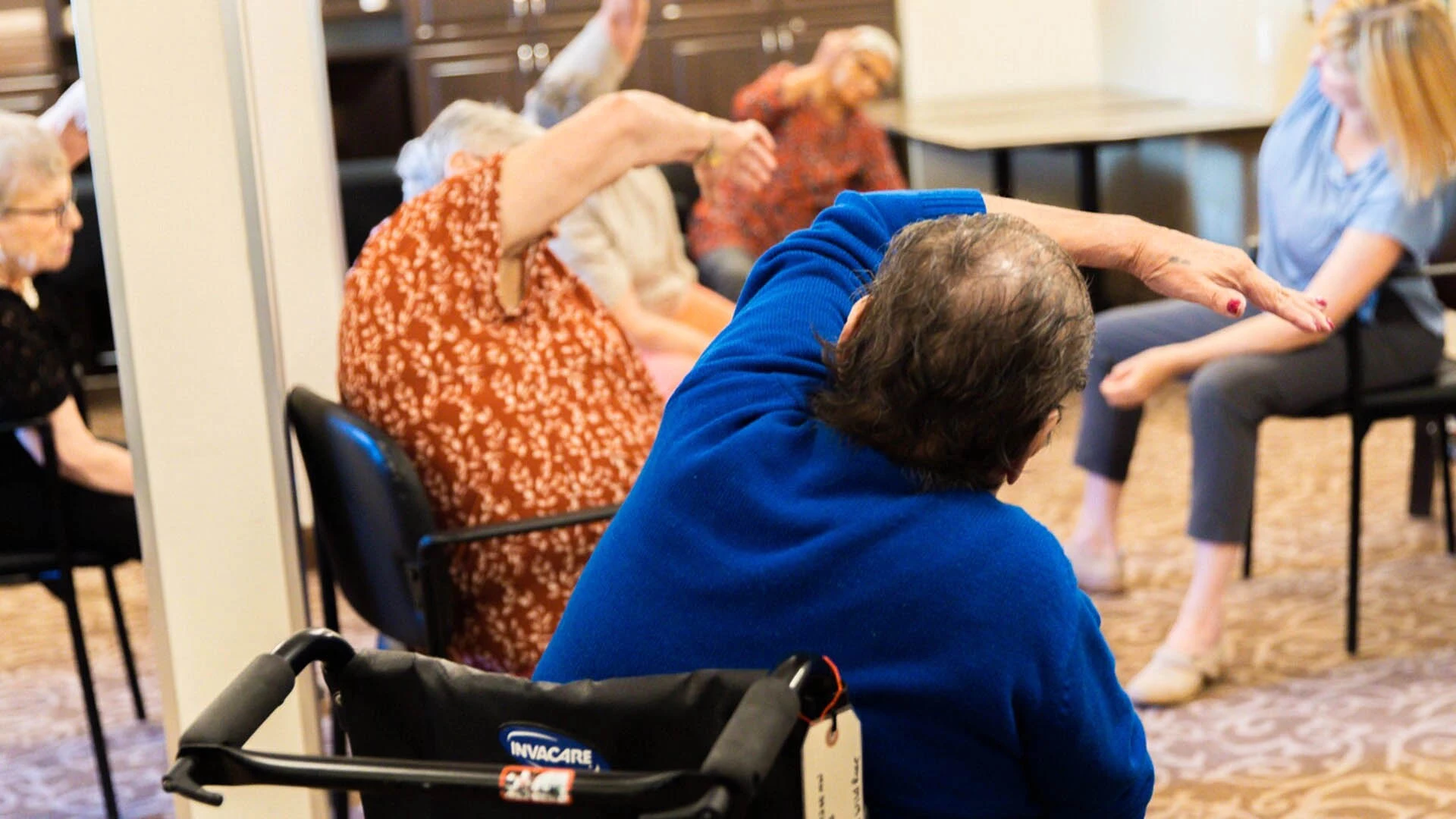 Seniors doing chair exercises